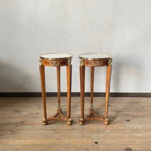 A French Empire style gueridon tables