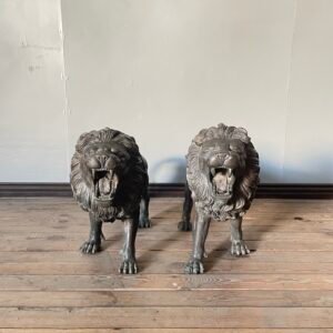 a-pair-of-bronze-lion-sculptures